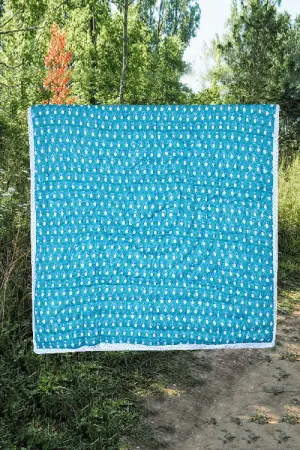 Earthen Nest Blue Penguin Kids Quilt